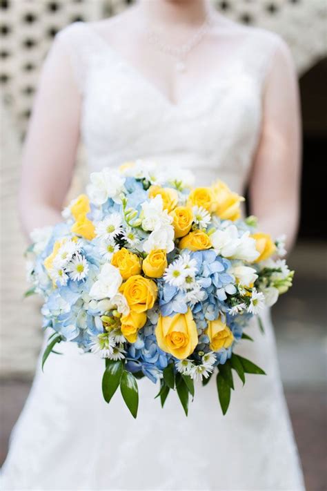 blue and yellow wedding bouquets|More.